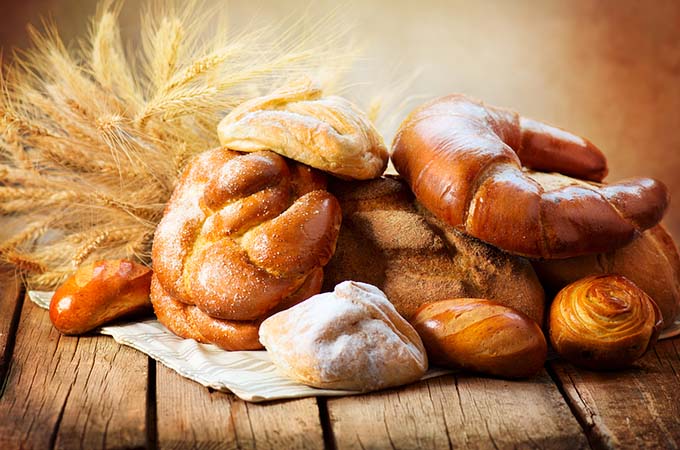 bigstock-Bakery-Bread-on-a-Wooden-Table-47966615