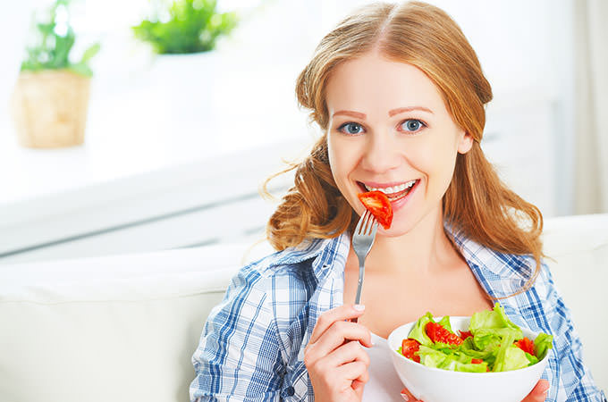 bigstock-Woman-Eating-Healthy-Vegetaria-110875376