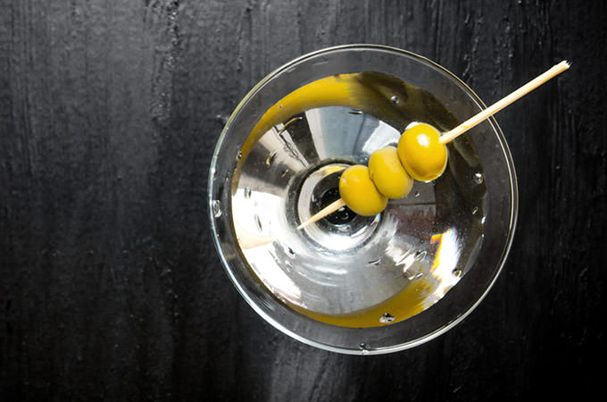 bigstock-martini-with-olives-on-a-black-115281827