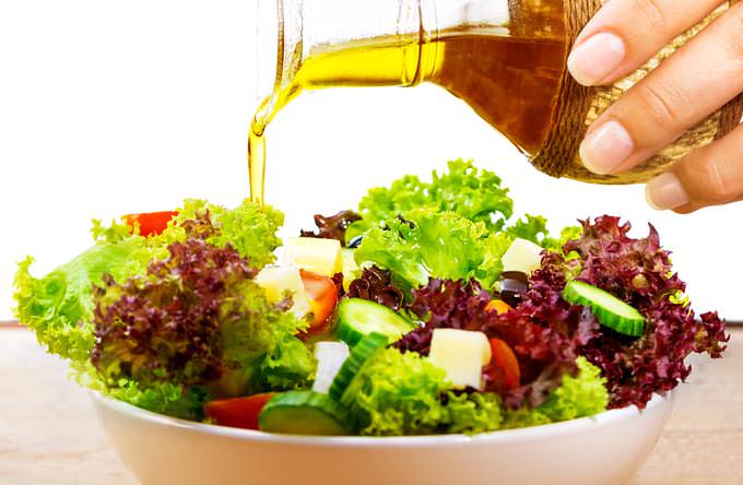 bigstock-Fresh-salad-with-olive-oil-iso-51537967_mini