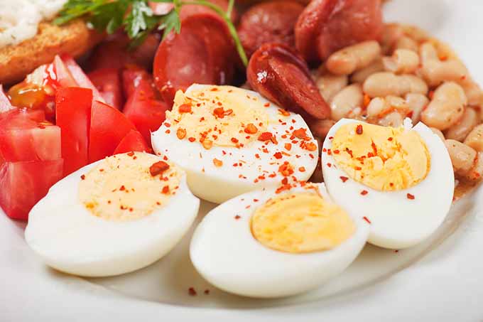 bigstock-Hard-boiled-chicken-eggs-with--47607313