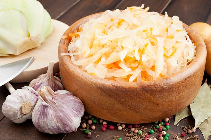 bigstock-Sauerkraut-With-Carrot-In-Wood-46126129