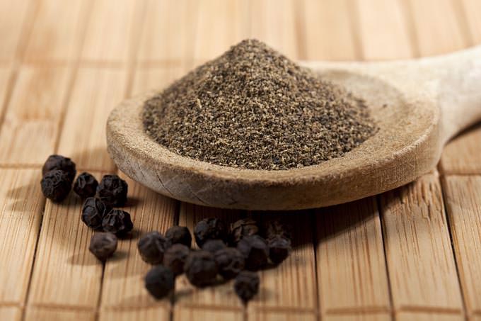 bigstock-heap-of-powdered-black-pepper--43909138_mini