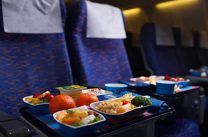 bigstock-Tray-of-food-on-the-plane-bus-34265474