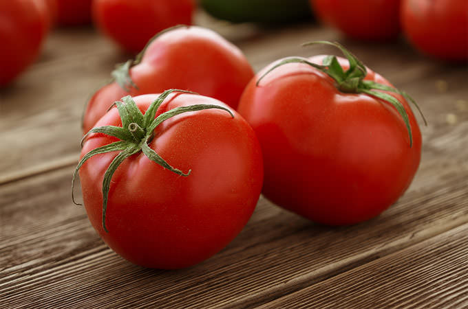 bigstock-Close-up-of-fresh-ripe-tomato-87474287