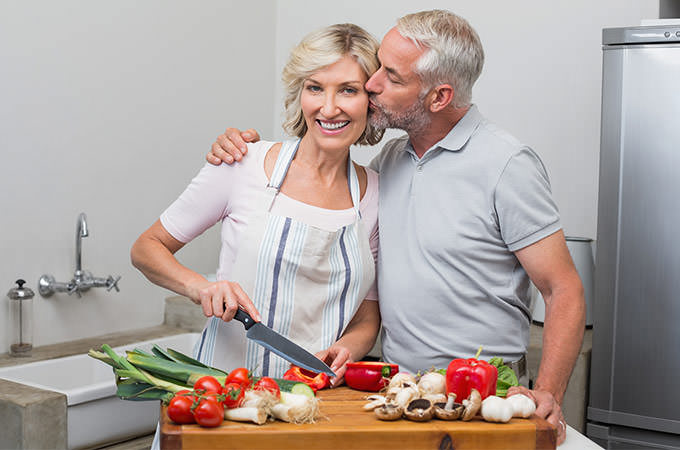 bigstock-Mature-man-kissing-woman-as-sh-60920540