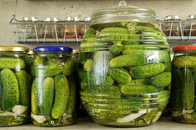 bigstock-Pickled-green-cucumbers-in-gla-49802981