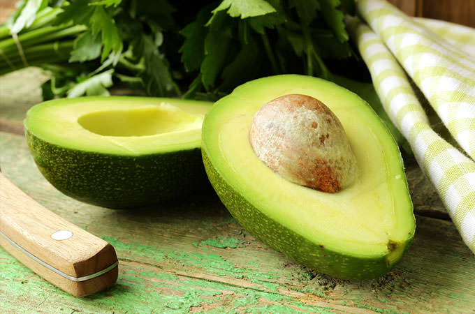 bigstock-ripe-avocado-cut-in-half-on-a--45744277