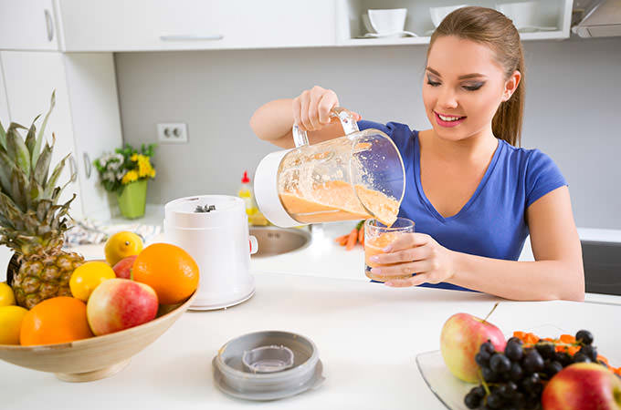 bigstock-Woman-pouring-healthy-fresh-h-78222593