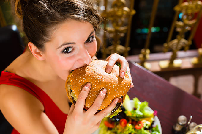 bigstock-Young-woman-in-a-fine-dining-r-41930269