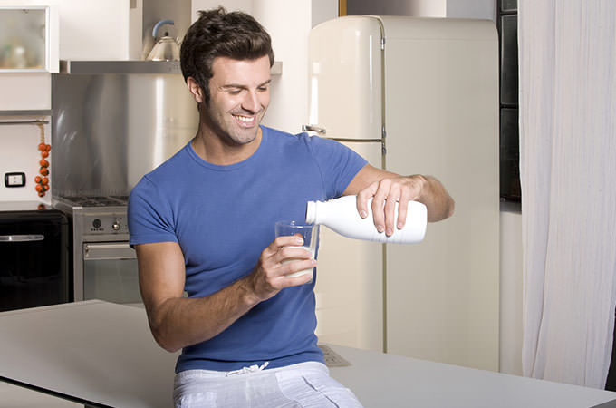 bigstock-man-drinking-milk-11485004