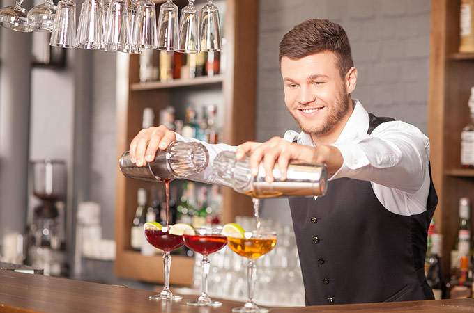 bigstock-attractive-young-barman-is-mak-103582034